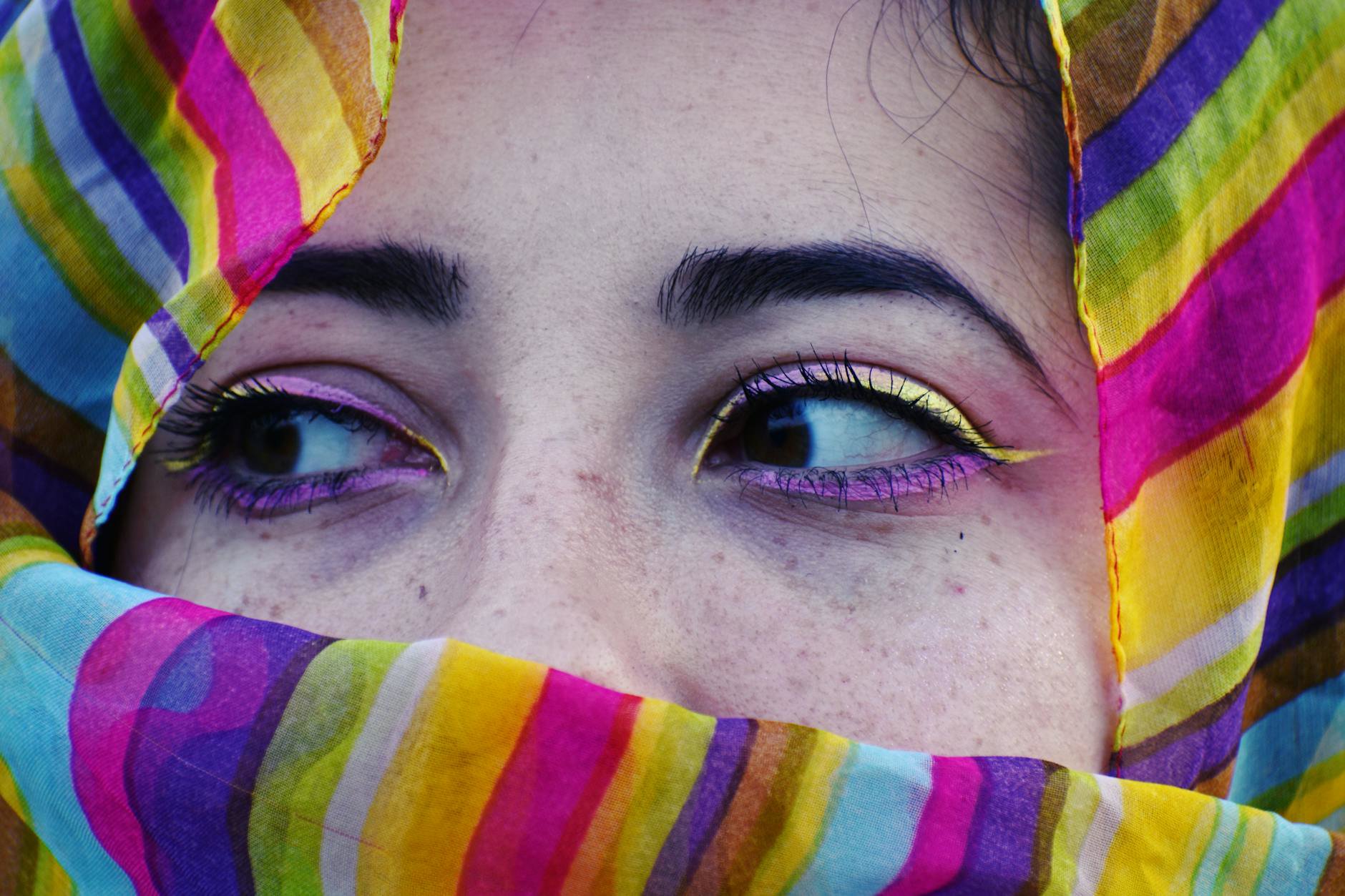 colourful eyeliner look on woman close up