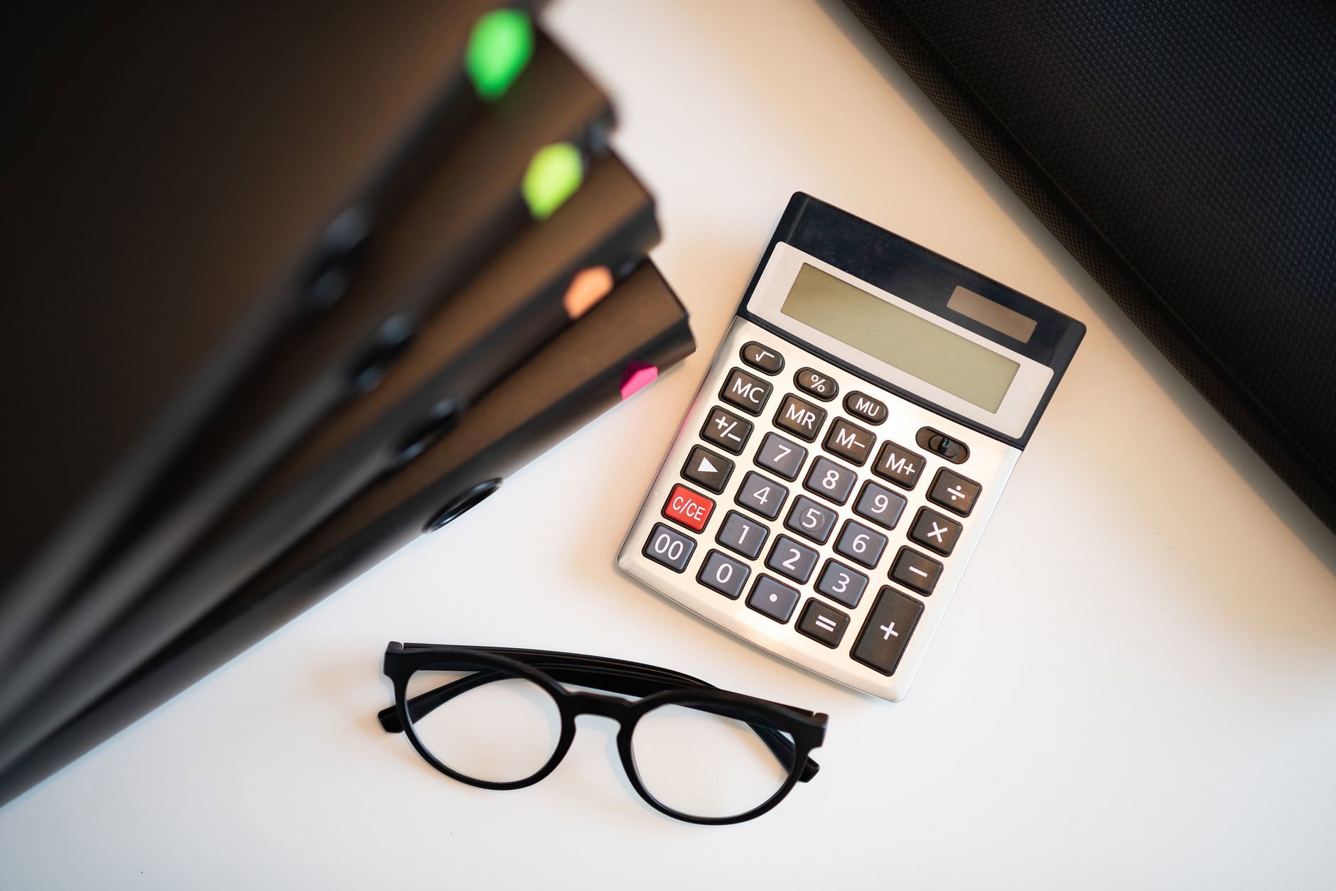 calculator next to hair products