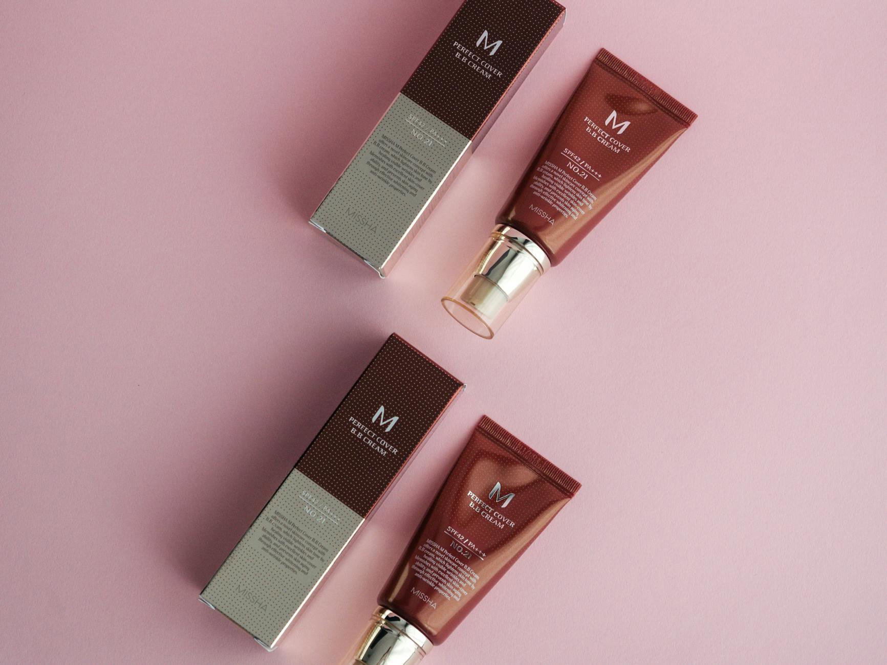 flatlay of authentic skincare boxes showing batch codes