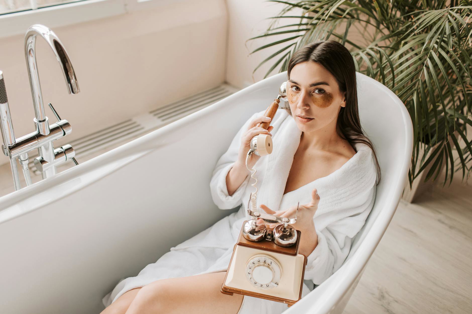 woman comparing skincare prices on phone in bathroom