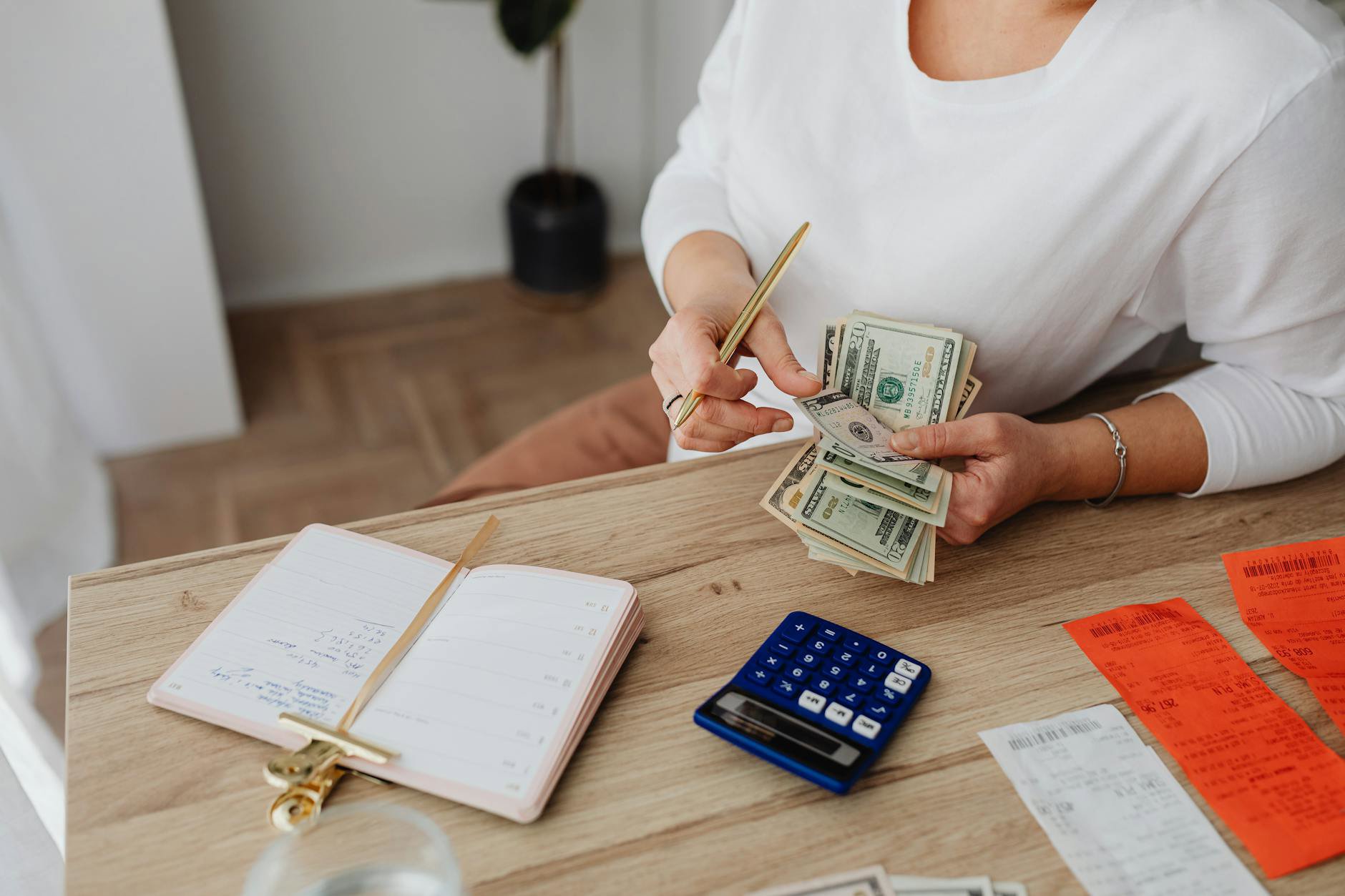 woman skincare routine budget planning notebook