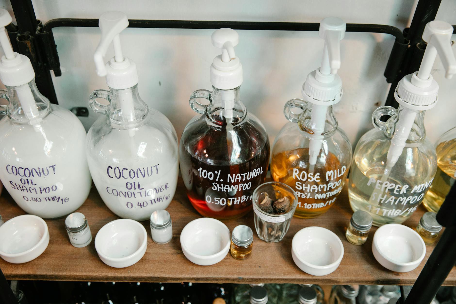 Living Proof No Frizz Shampoo bottle bathroom shelf