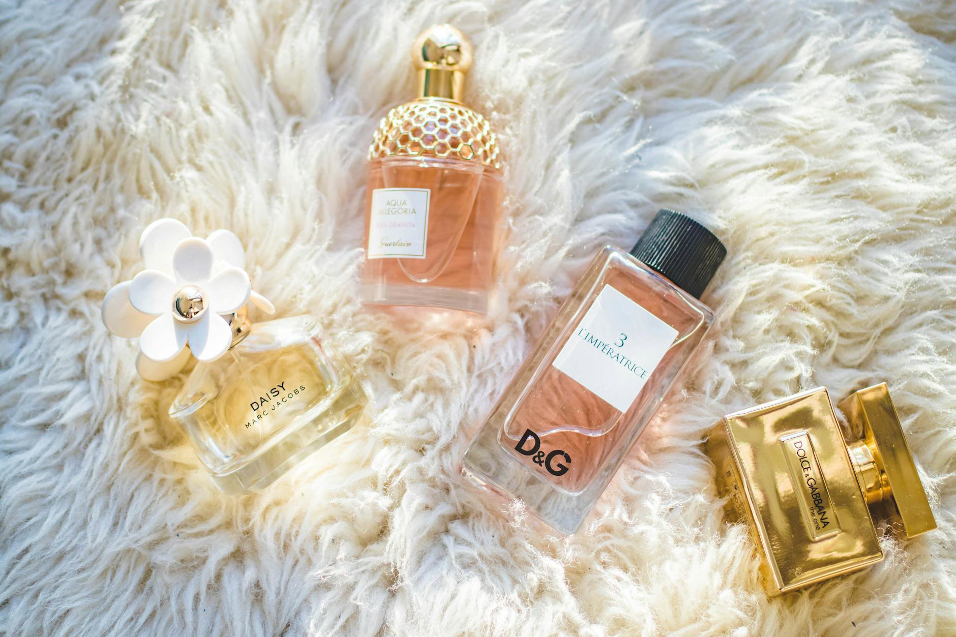 perfume bottles on vanity flatlay