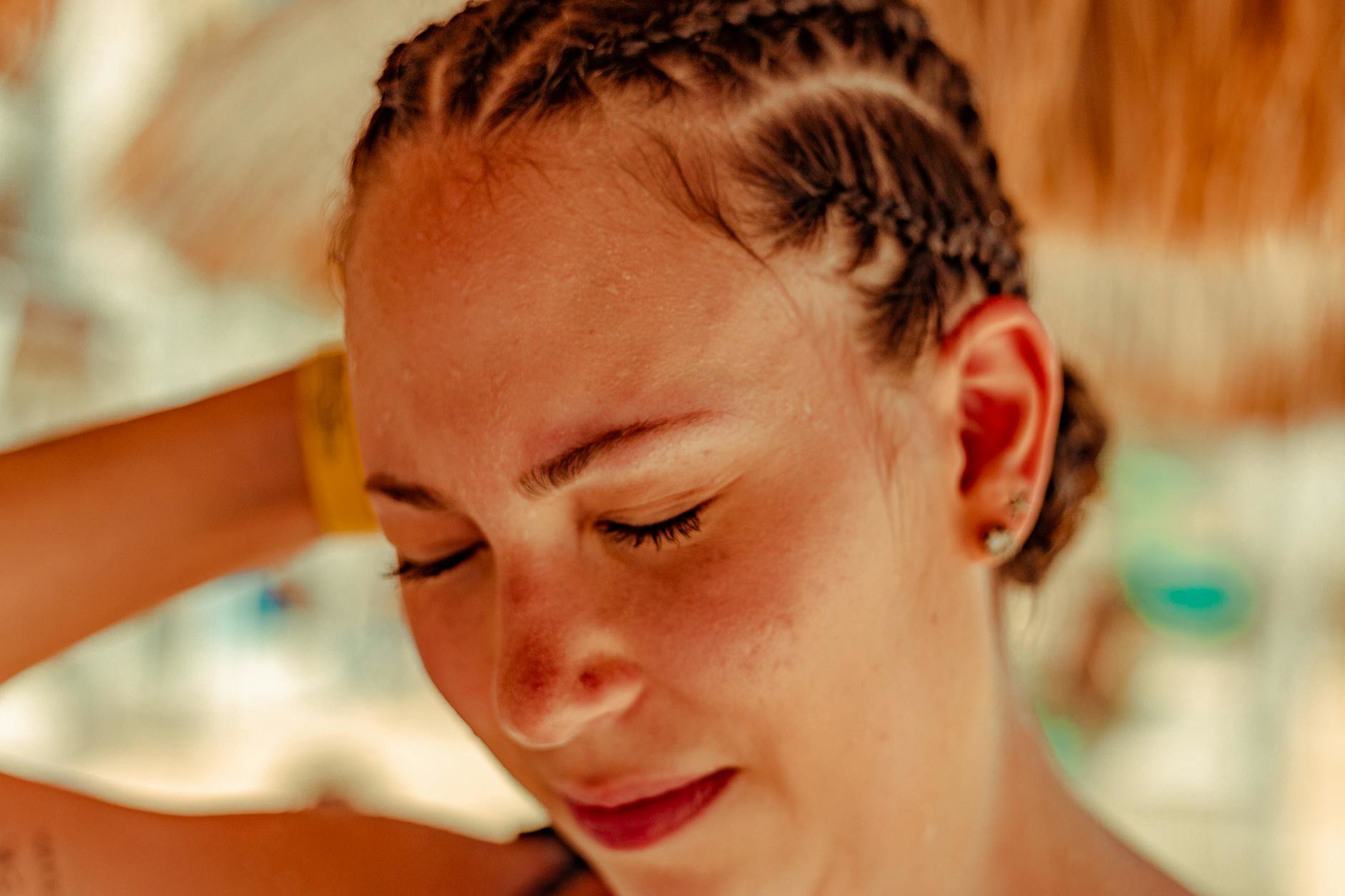 close up tanning drops on cheek