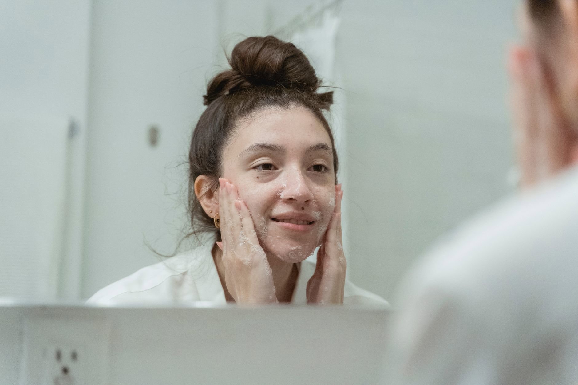 cream cleanser application face