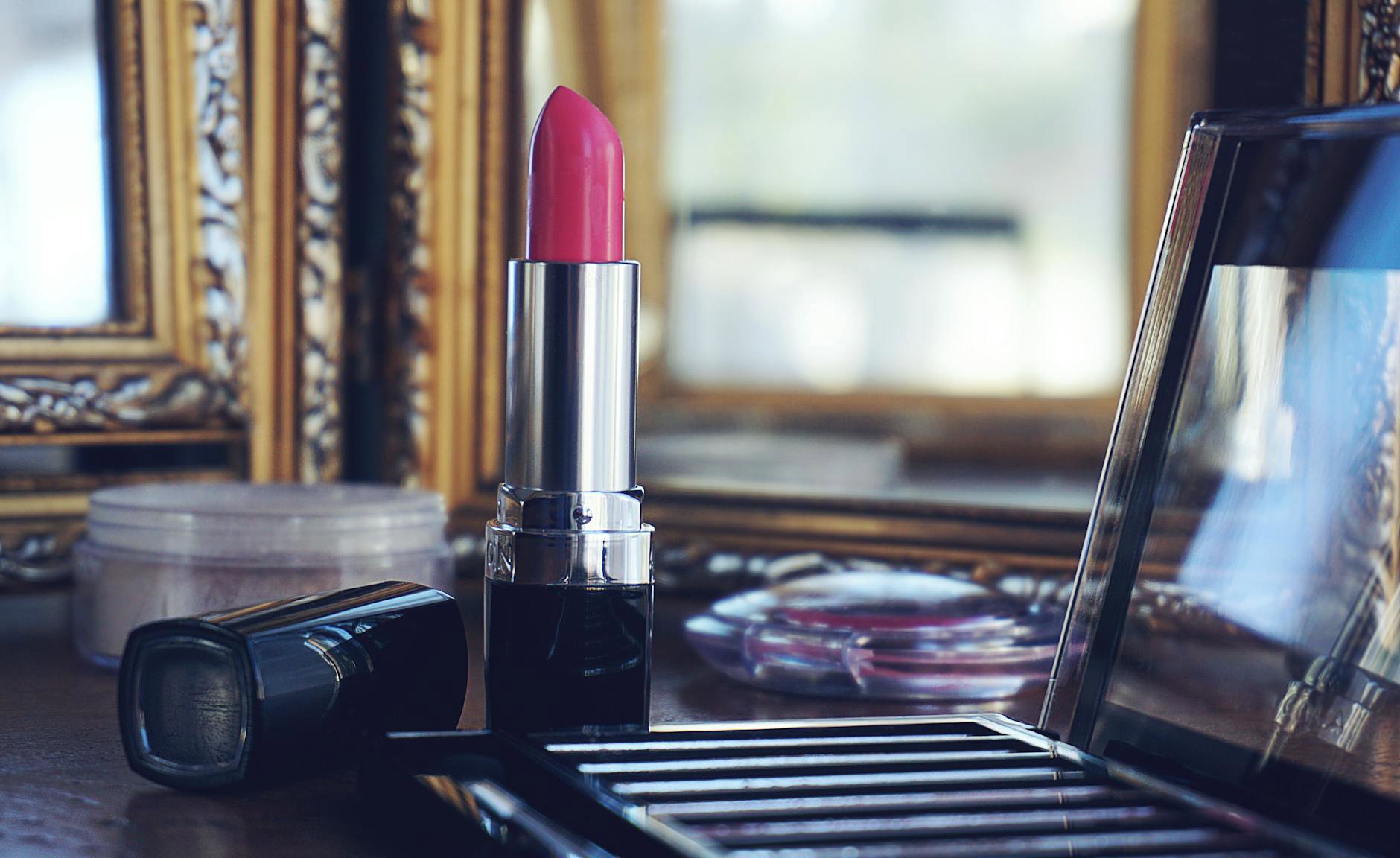 makeup products on vanity with expiry symbols