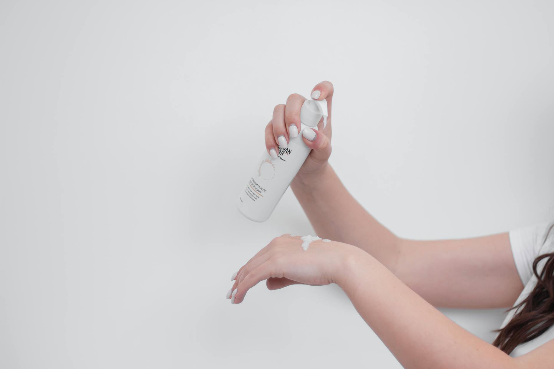 woman applying toner with hands close up