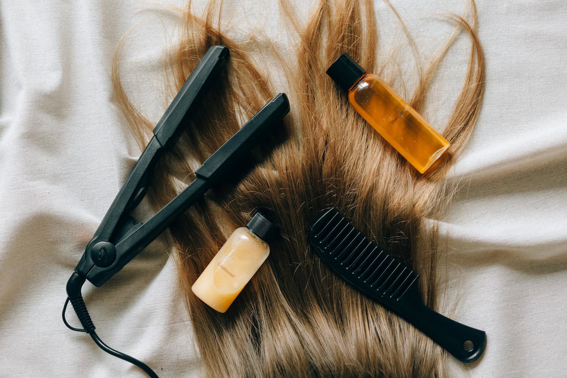 hair straightener and hairspray bottle