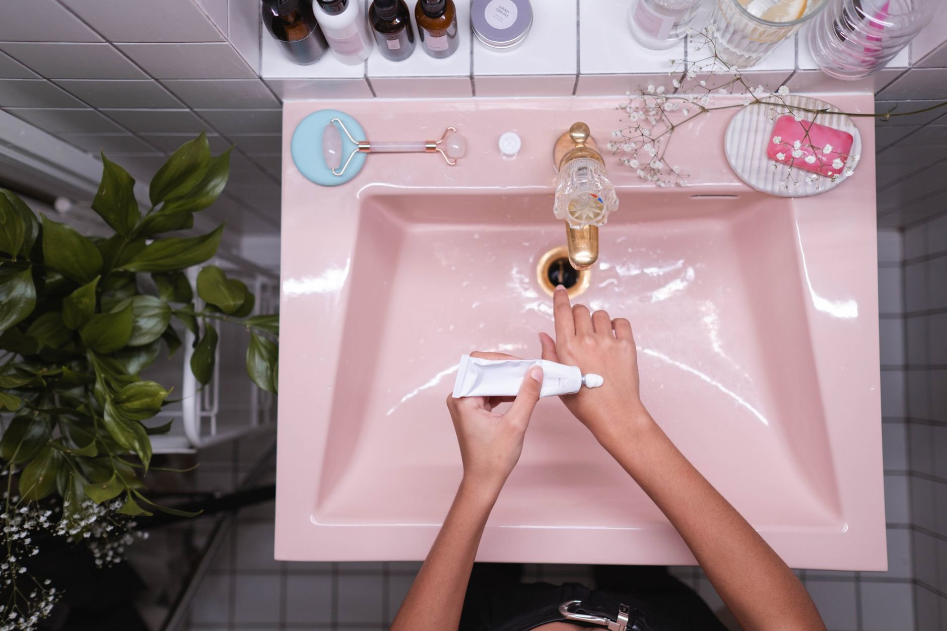 luxury hand wash and hand cream set on sink