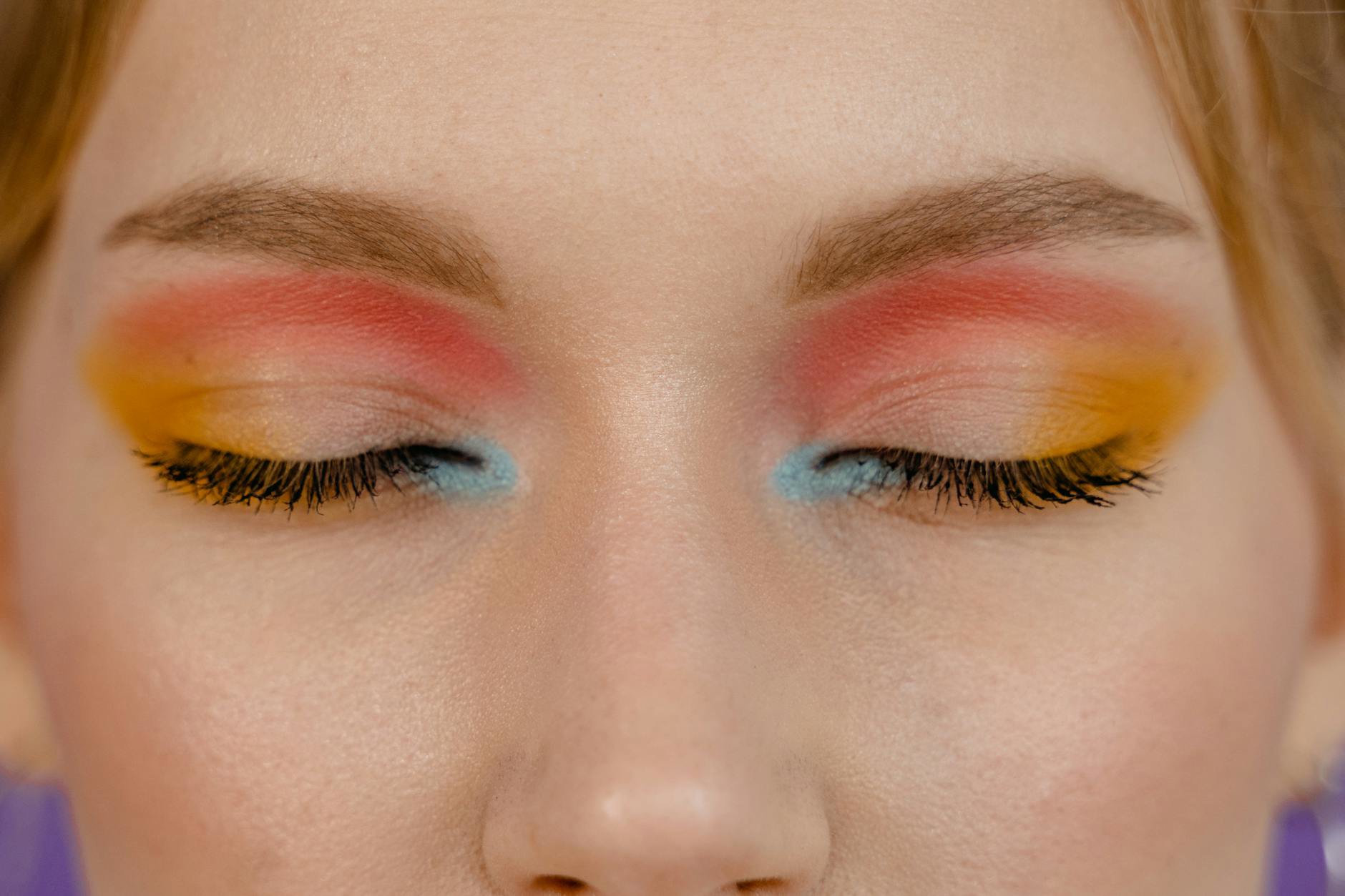 blue eyes copper eyeshadow close up