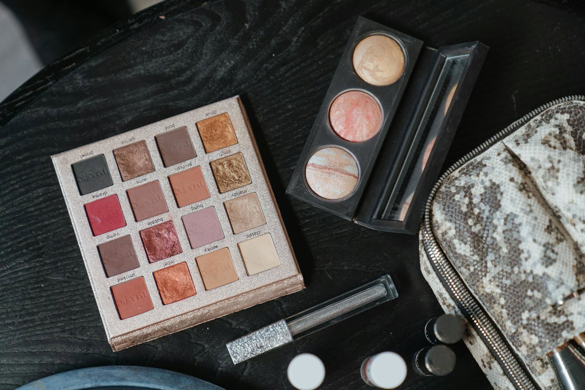 eyeshadow palette flatlay neutral and shimmer pans