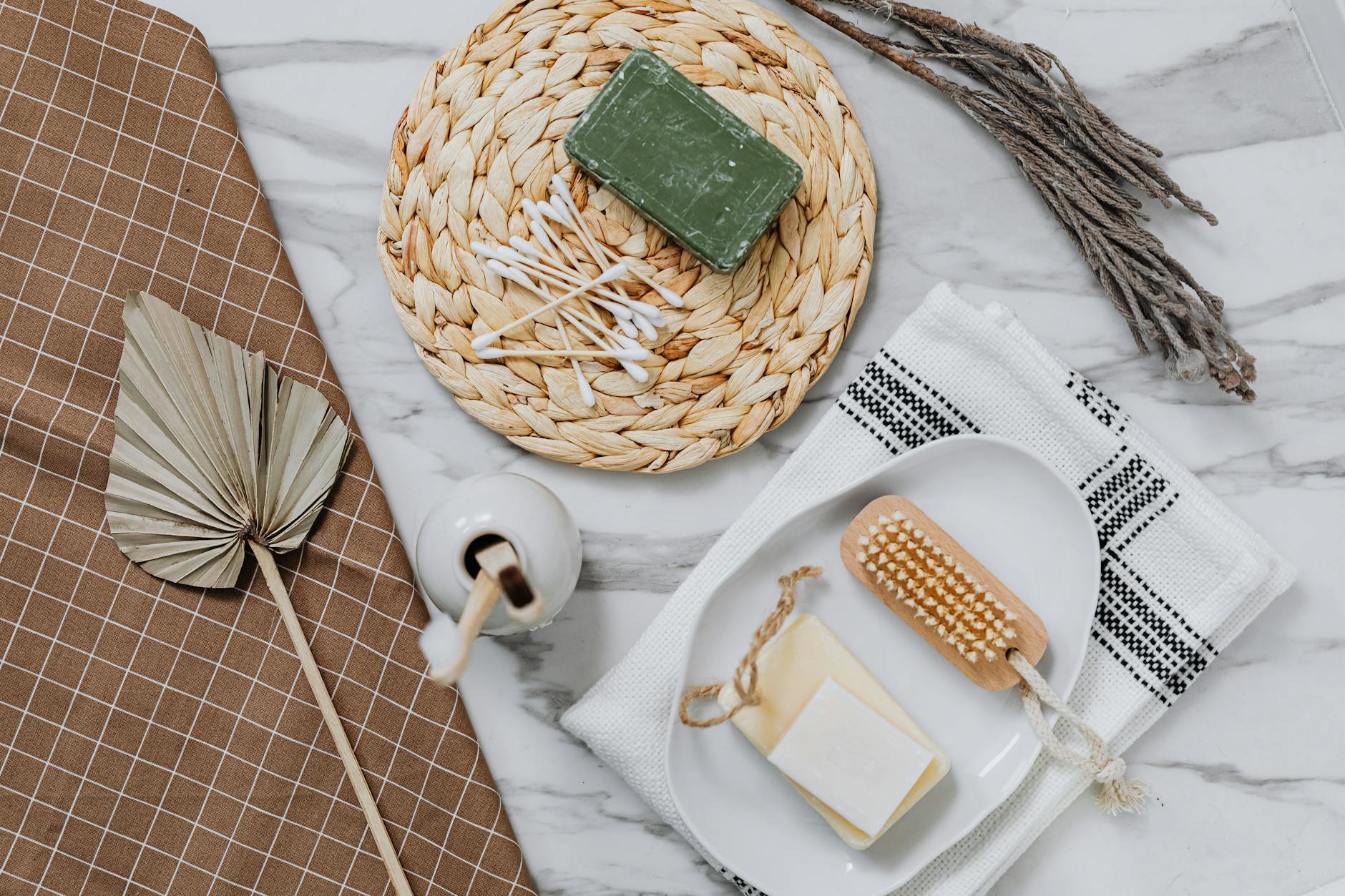 flat lay makeup brushes on clean towel bathroom