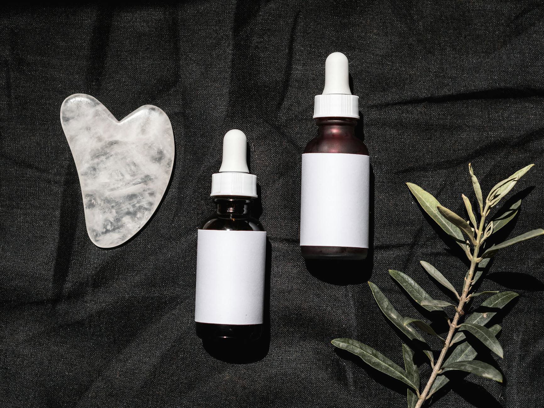 skincare routine products flatlay serum sunscreen