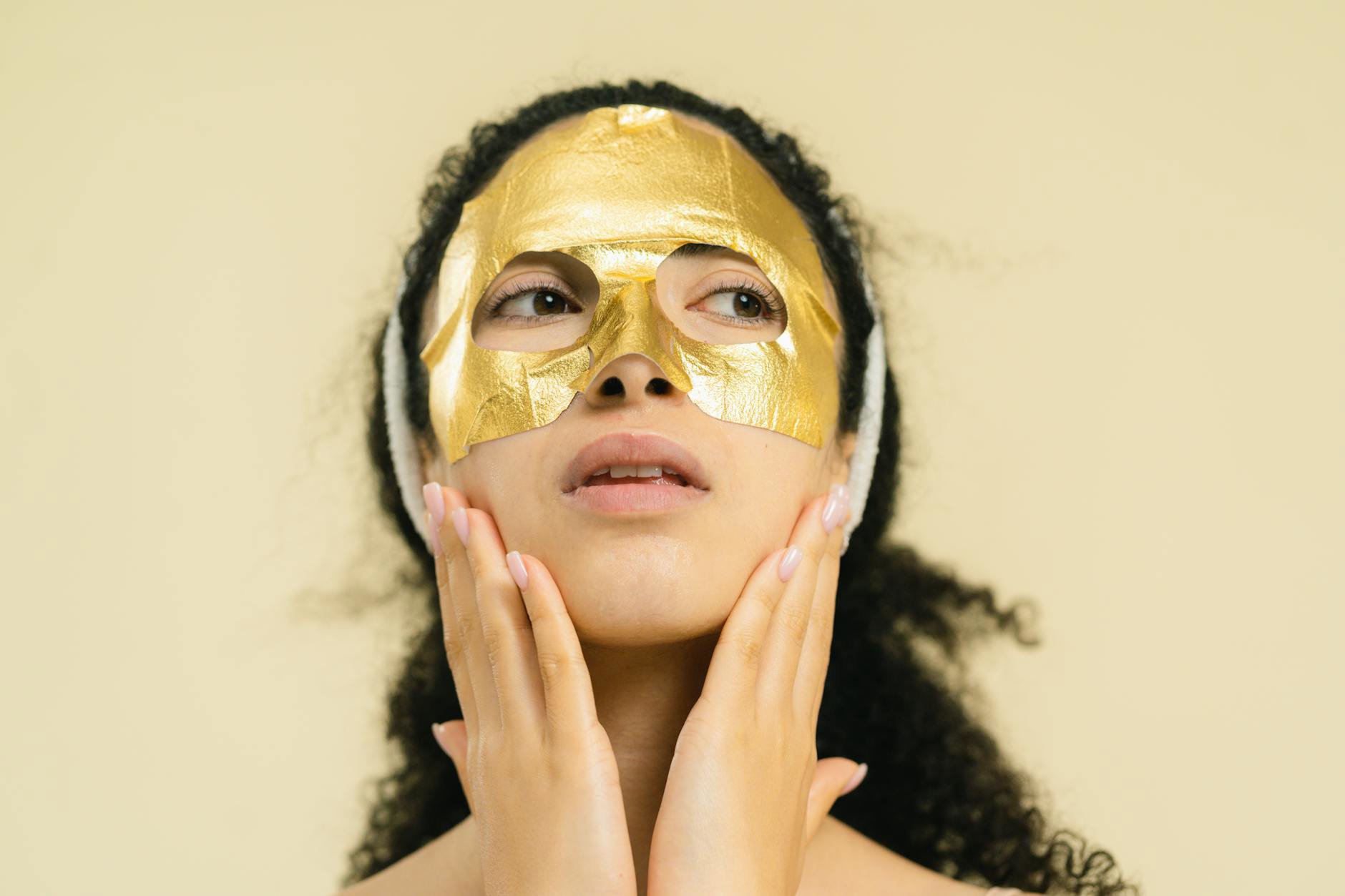sheet mask on face relaxing at home