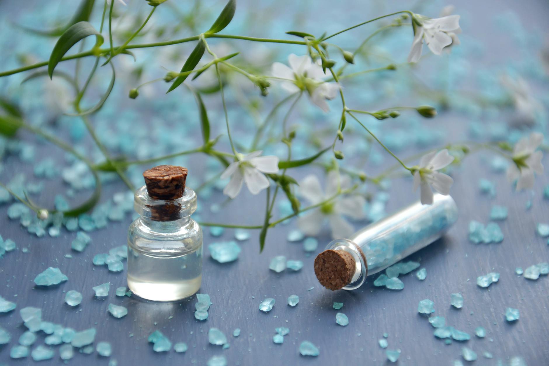 perfume bottle sea salt crystals on vanity