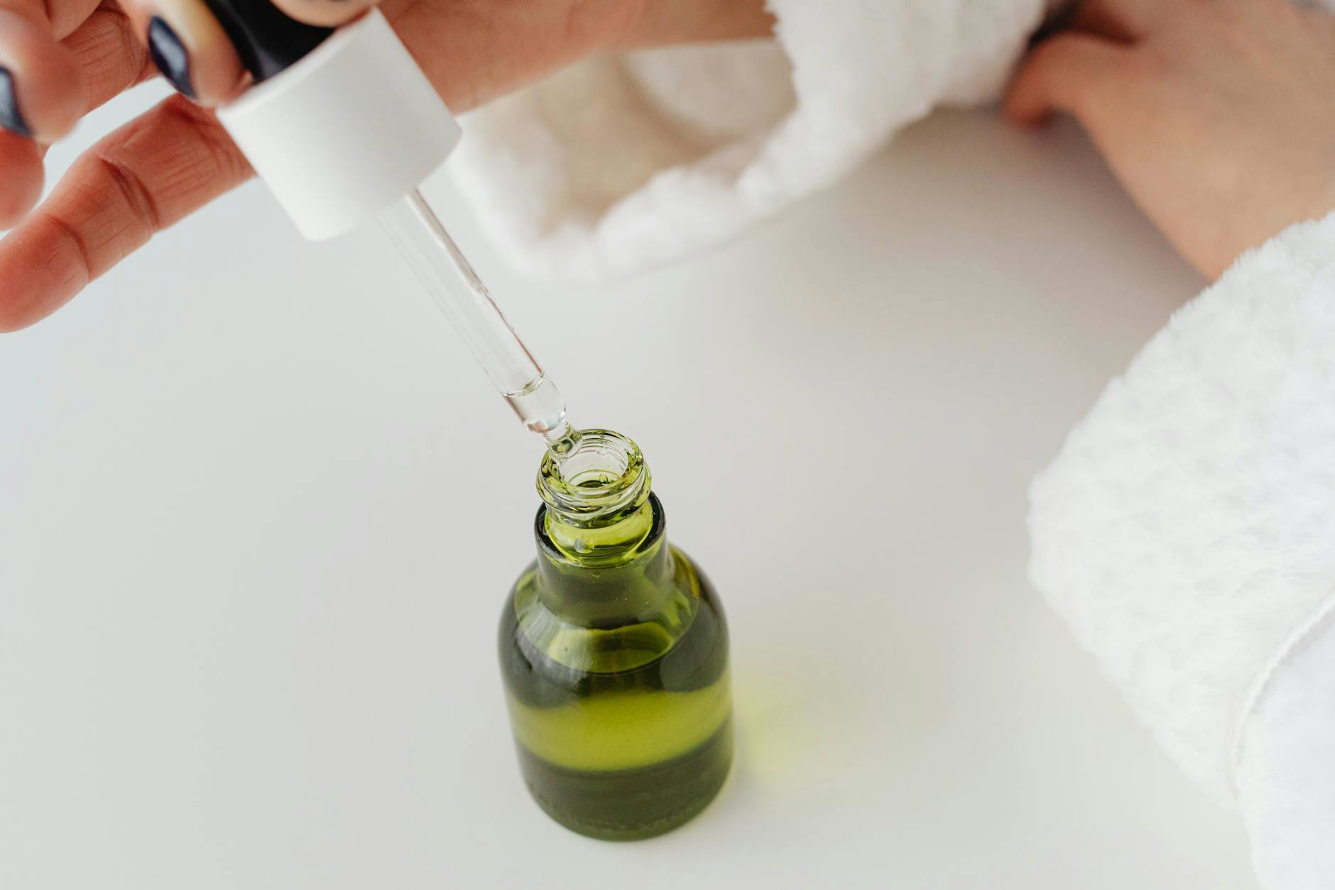 peptide serum dropper bottle on vanity