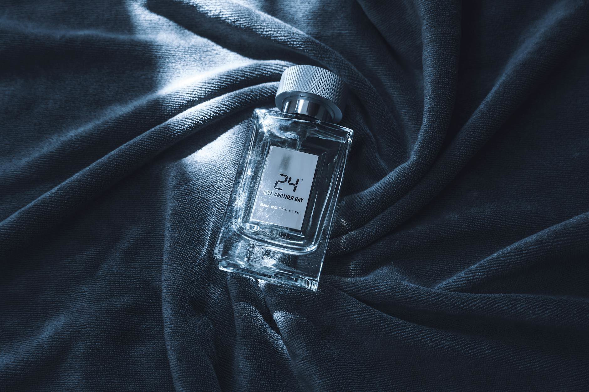 perfume bottles vanilla amber cozy flatlay
