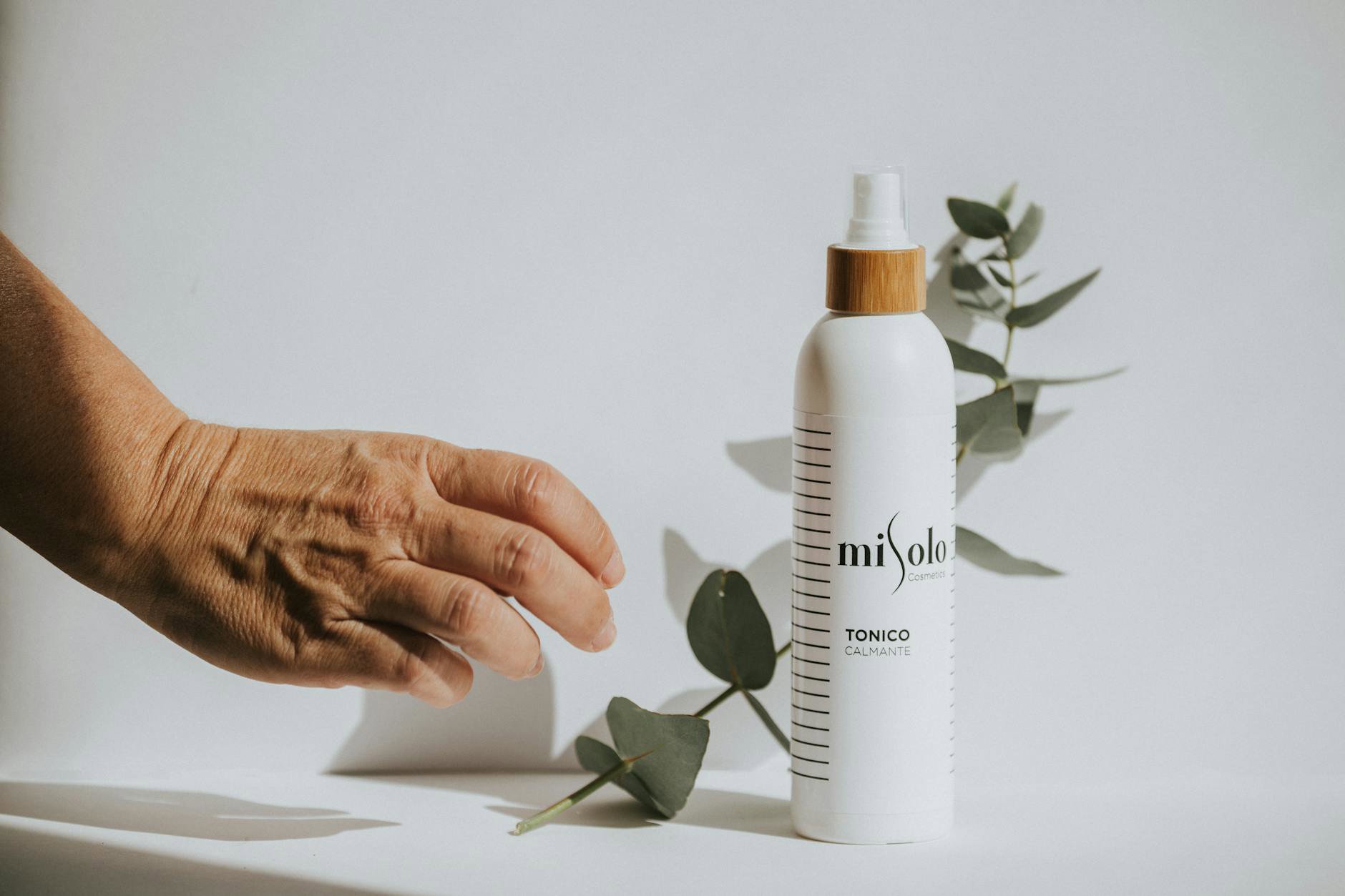 skincare routine evening soft light toner in hand