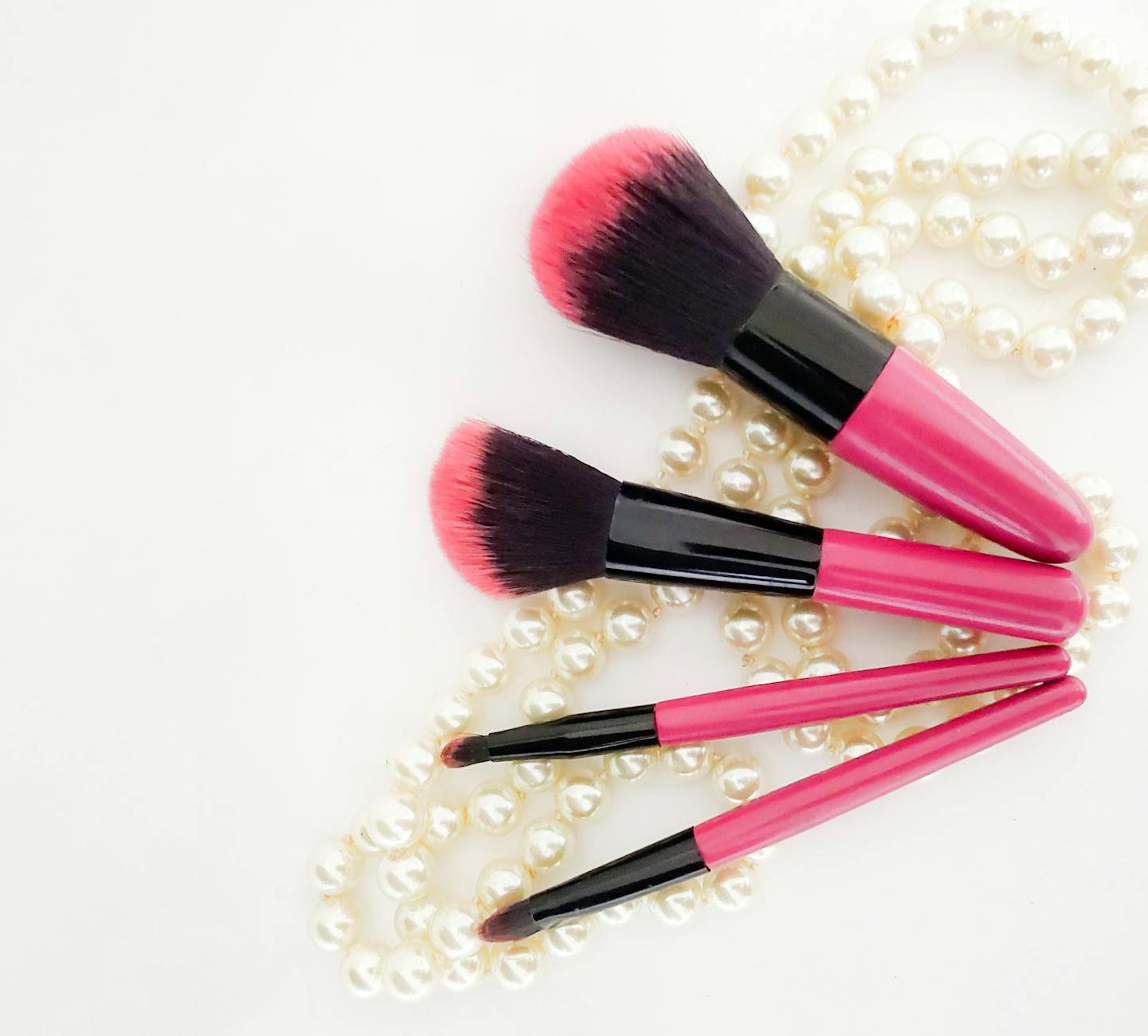 woman cleaning makeup brushes