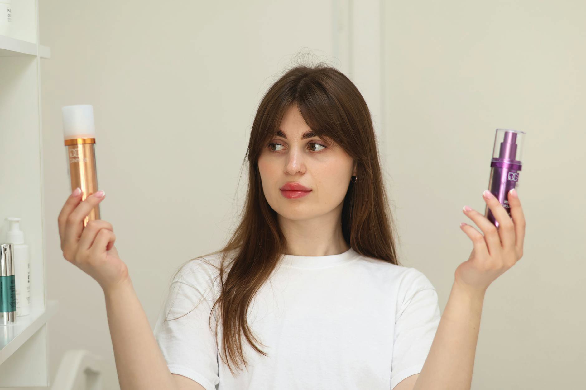 woman comparing skincare prices on phone at vanity