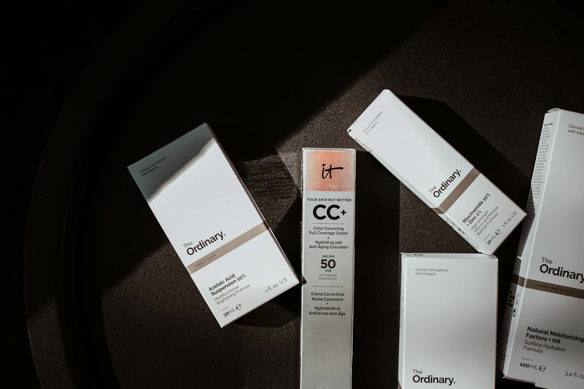 skincare products flatlay vitamin c serum spf moisturiser