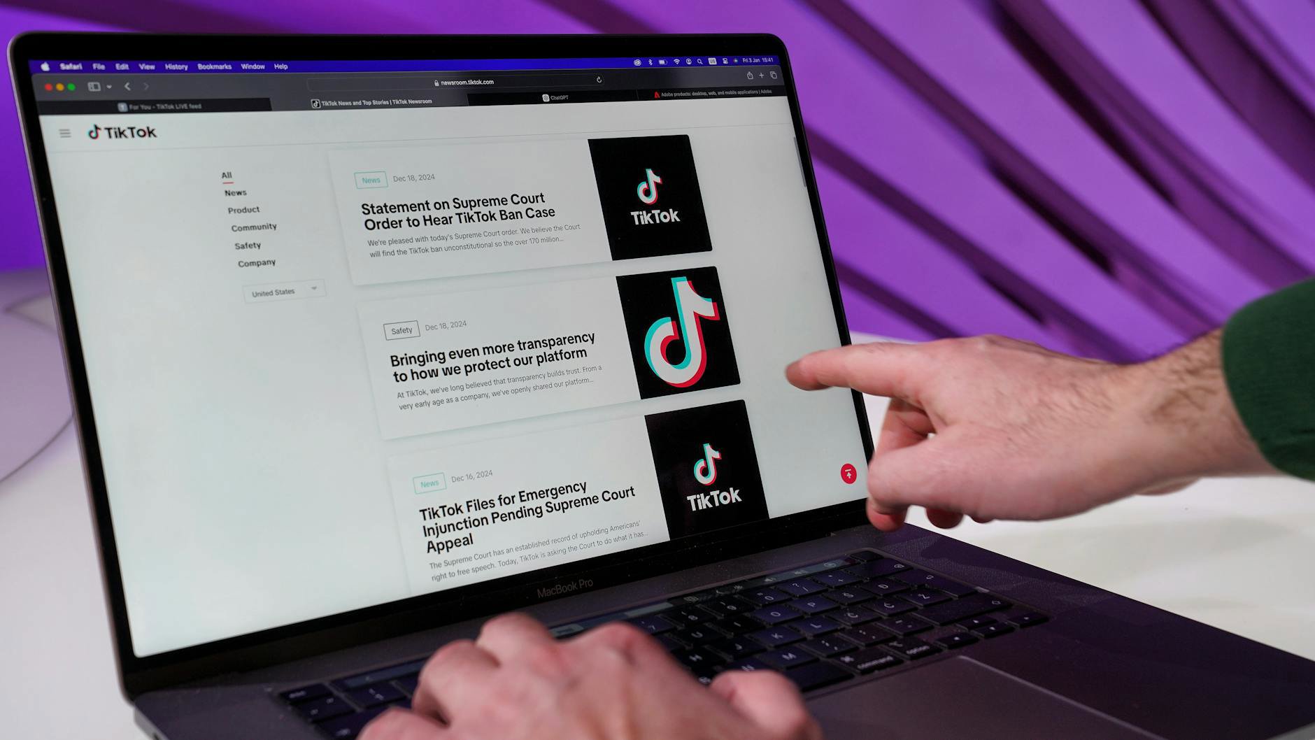 woman scrolling TikTok beauty products at vanity
